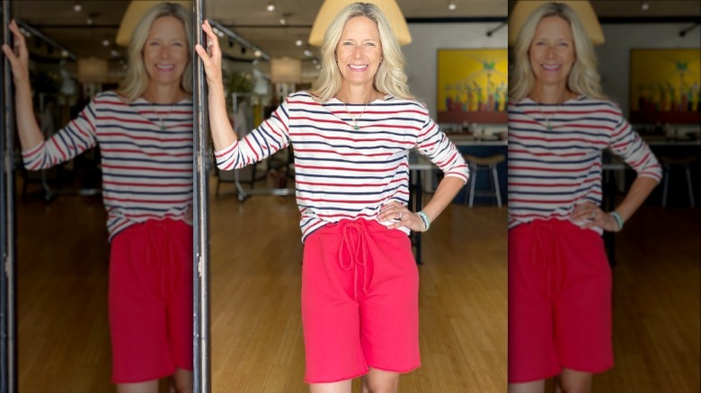 woman in red sweat shorts