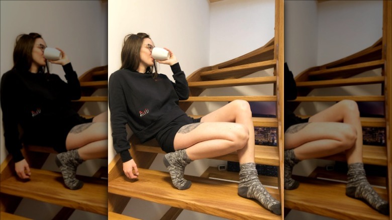 woman wearing black sweat shorts set