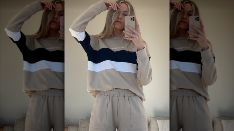 woman wearing beige sweat shorts set