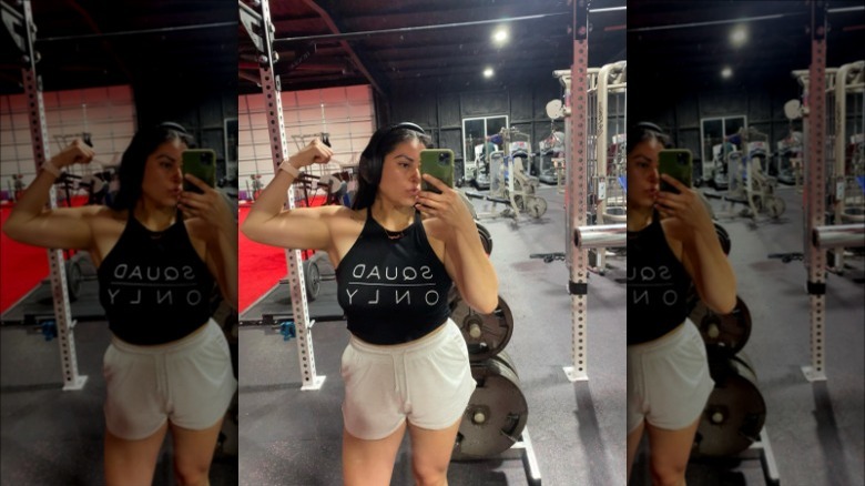 woman wearing grey workout sweat shorts