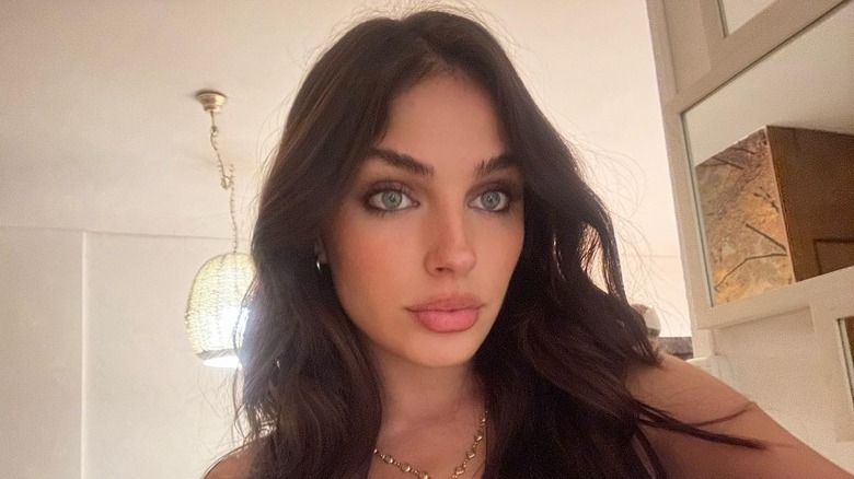 Girl with fluffy eyebrows.