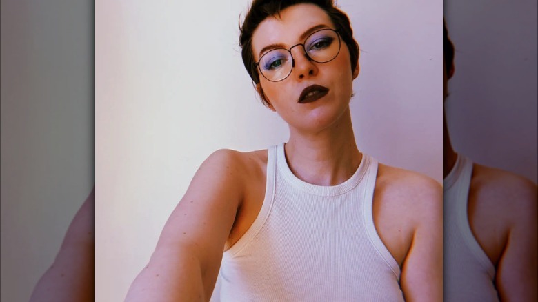 Person wearing dark brown lipstick