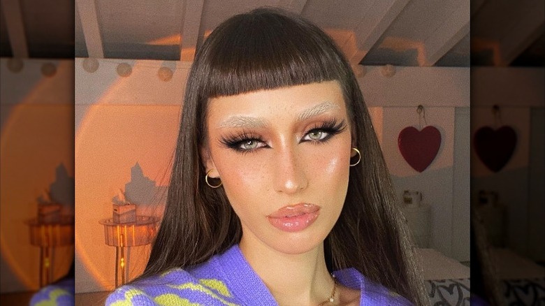 woman with bleached eyebrows