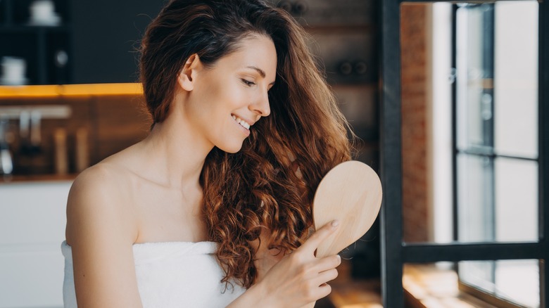 Woman brushing type 2 hair