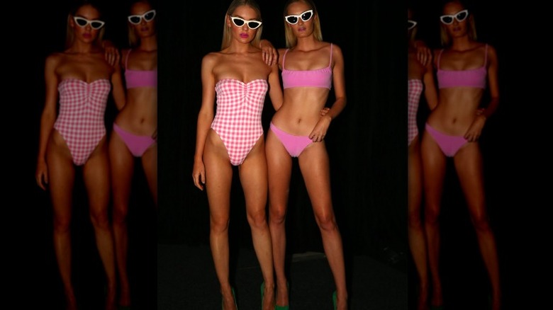 Women in pink bathing suits