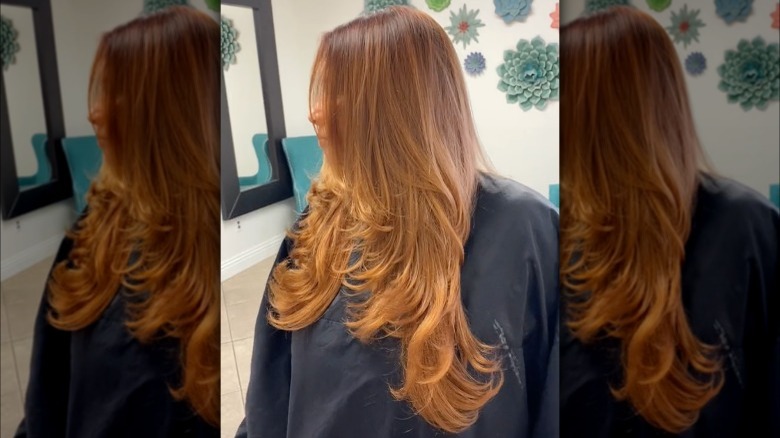 Woman with layered and colored hair