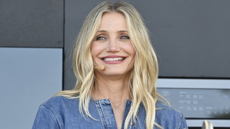 Cameron Diaz smiles at a crowd as she speaks about her organic wine brand