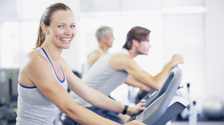 woman smiling on treadmill