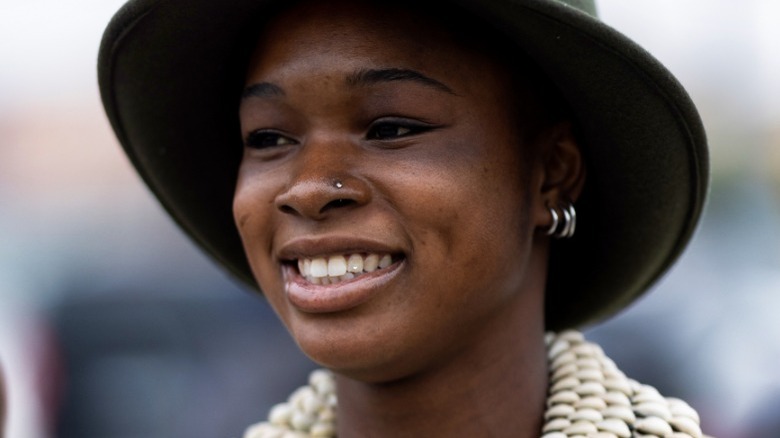 Stylish woman with nose stud