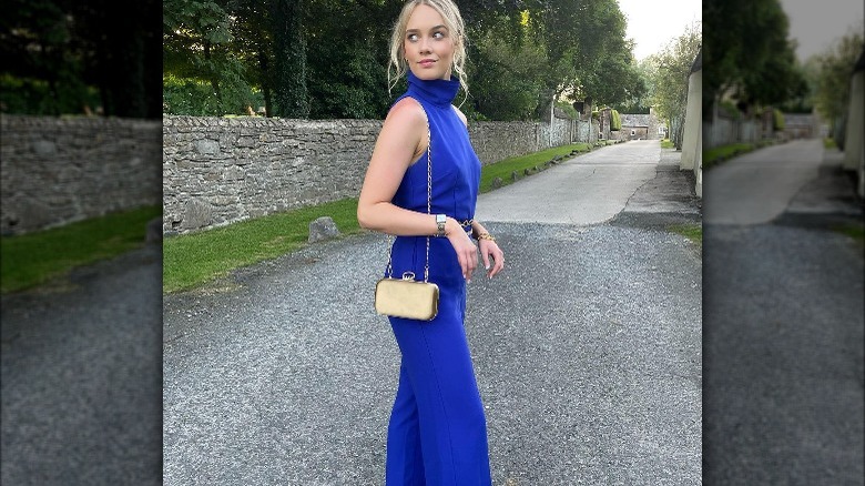 Woman in blue jumpsuit