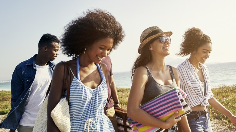 Friends together at the beach