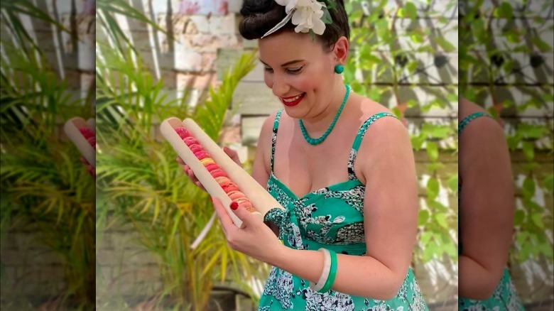 Woman in green dress and jewelry
