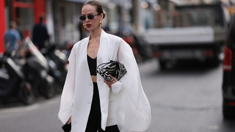 woman wearing caped blazer