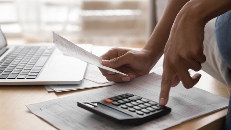 Calculator and paper on desk