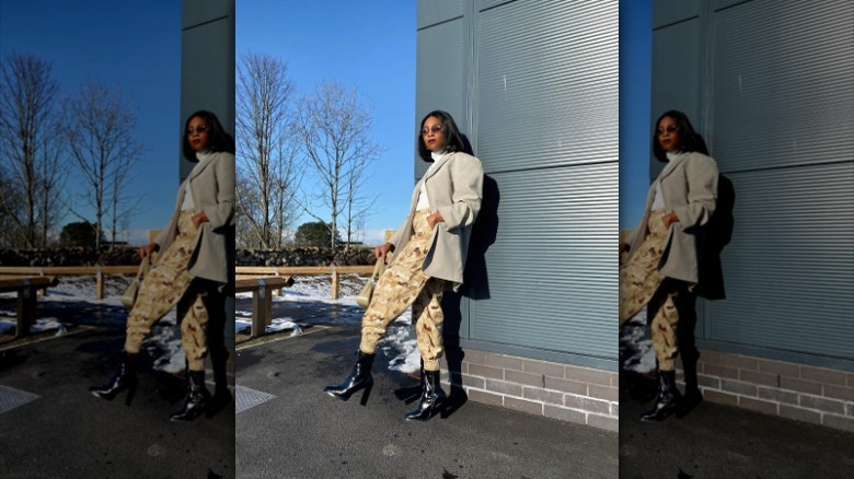 woman wearing camouflage cargo pants