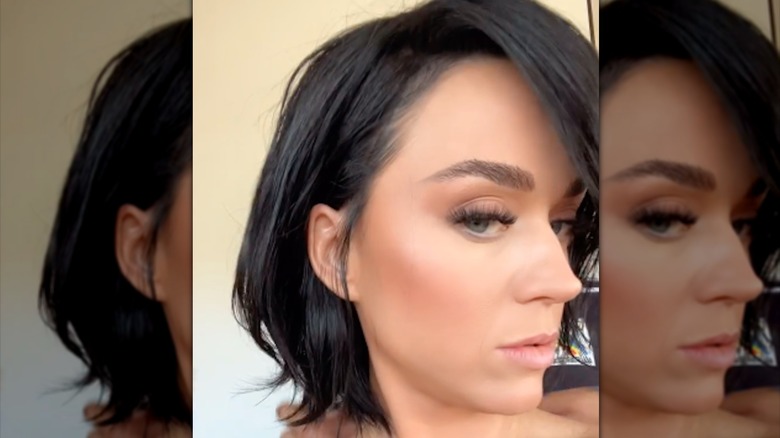 Katy Perry showing off a black wig in an Instagram video