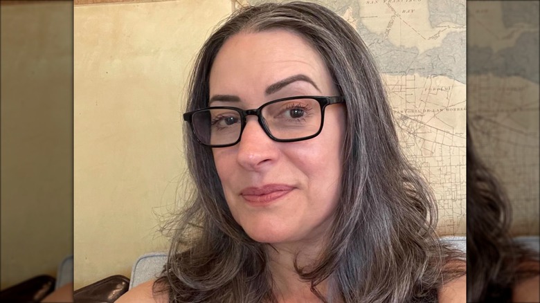 Paget Brewster with gray hair