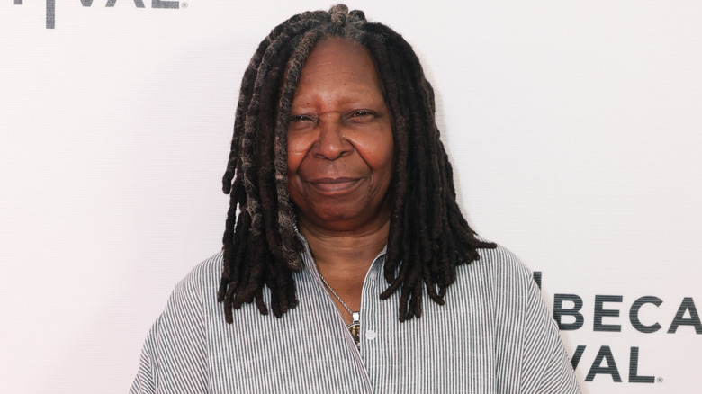 Whoopi Goldberg salt and pepper locs