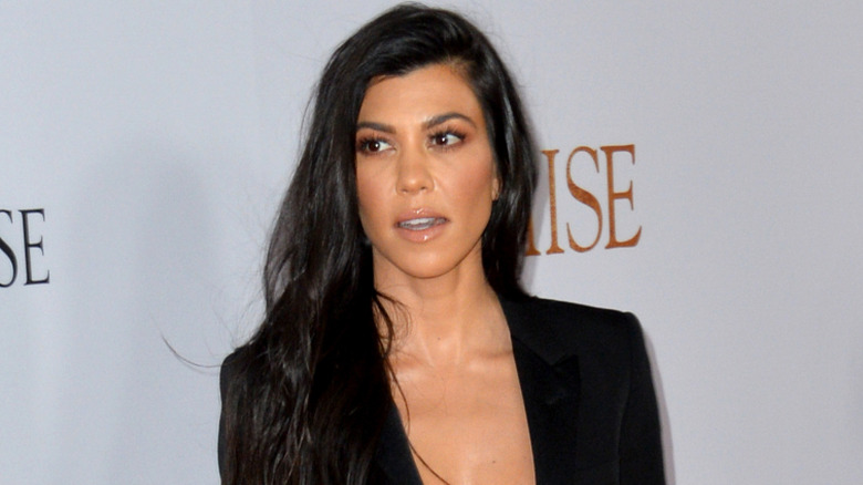 Kourtney Kardashian posing