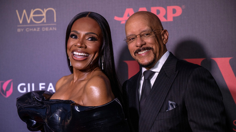 Sheryl Lee Ralph and husband Vincent Hughes smile while walking the red carpet together