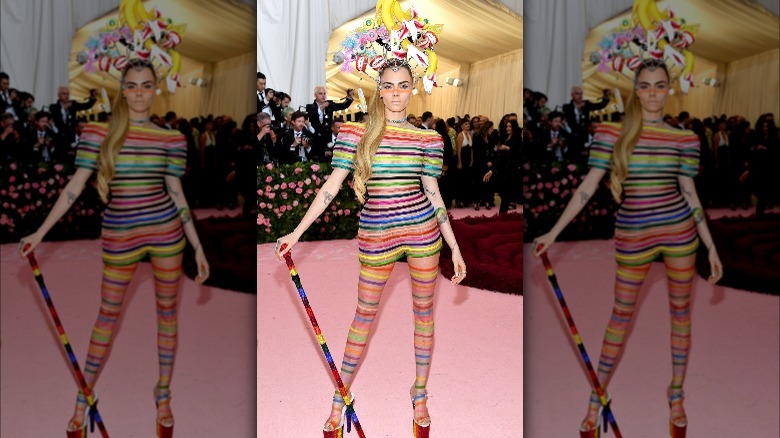 Cara Delevingne stripes on pink carpet