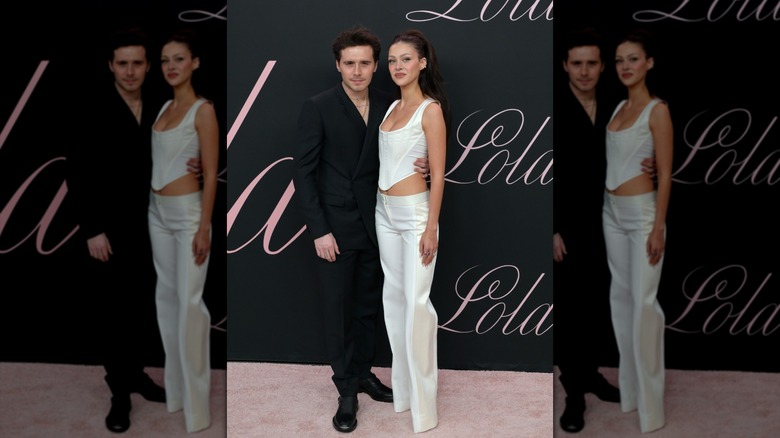 Nicola Peltz Beckham and Brooklyn Beckham posing together