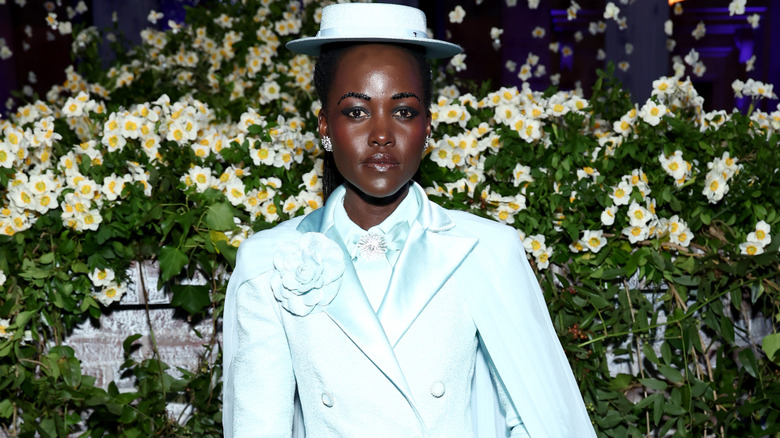 Lupita Nyong'o wearing an icy-blue outfit at the 2025 Met Gala