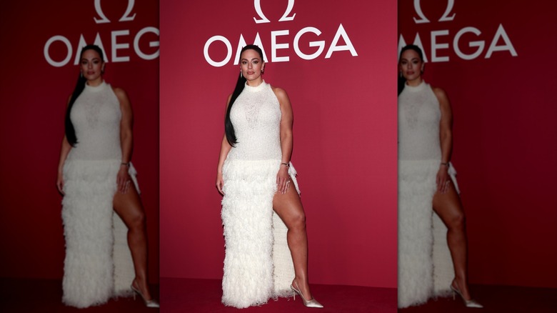 Ashley Graham posing at the Winter Olympics in February 2026