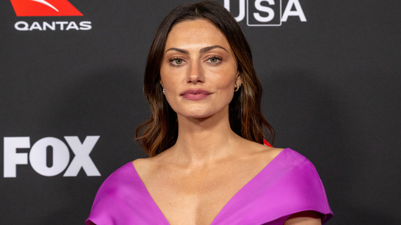 Phoebe Tonkin at an industry event in a pink outfit.