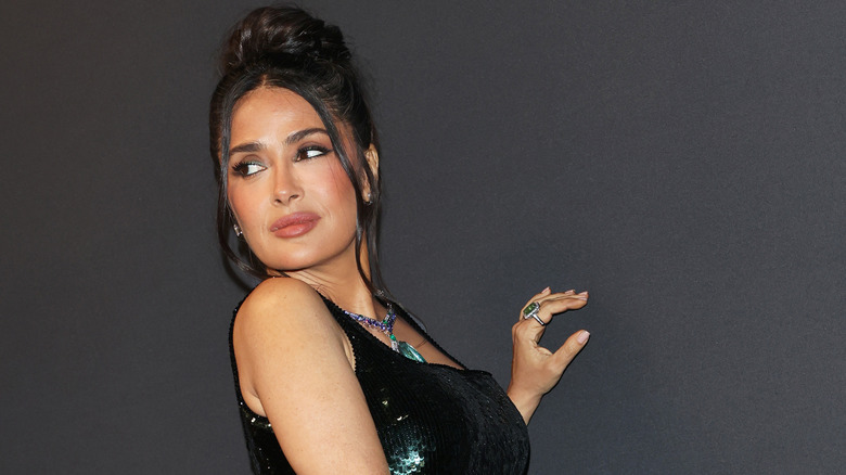 Salma Hayek at an industry event in a sequined dress.