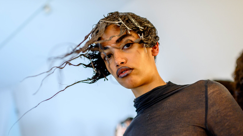 model backstage at Luar show