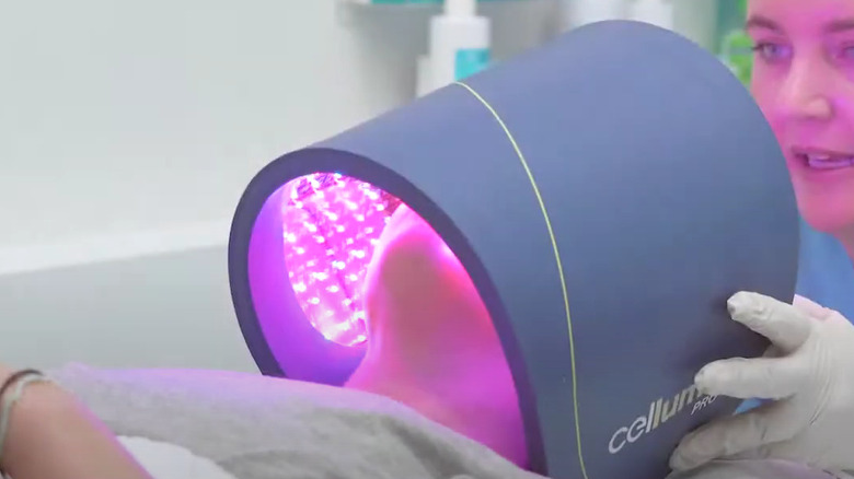 woman using celluma light therapy