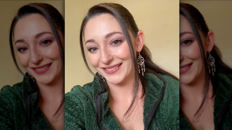 woman in chandelier earrings