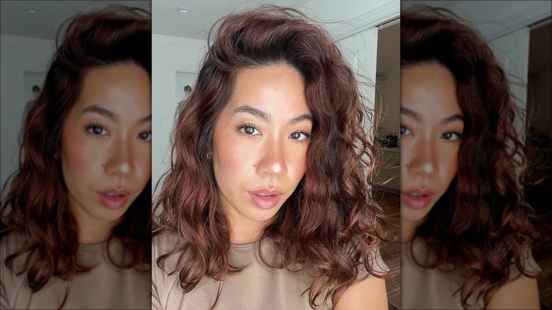 woman with cherry auburn hair