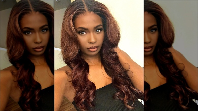 woman with cherry auburn hair