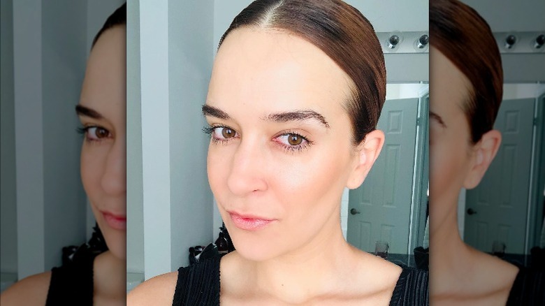 Instagram user @mariapills wearing cherry lip gloss