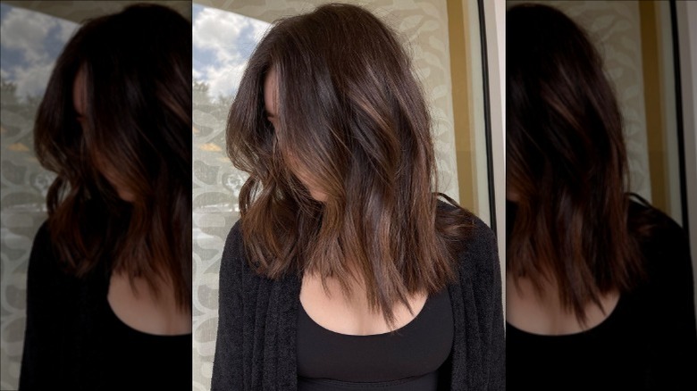woman with chocolate silk balayage