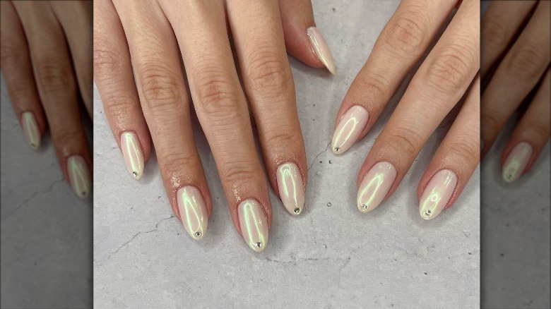 chromatic pearl nail color with rhinestones