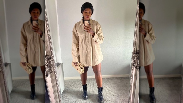 woman wearing chunky boots with a button-up