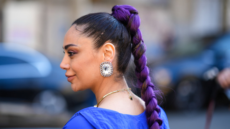 woman with chunky crystal earrings