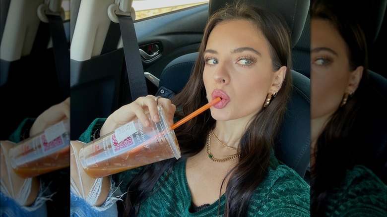 Brooke Hyland wearing chunky twisted hoops.