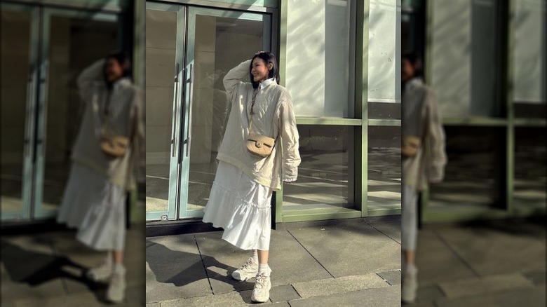 Asian woman in chunky sneakers