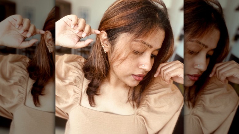 Woman with brown hair highlights