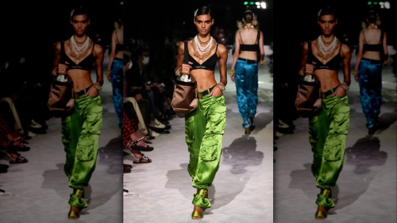 model in green cargo pants