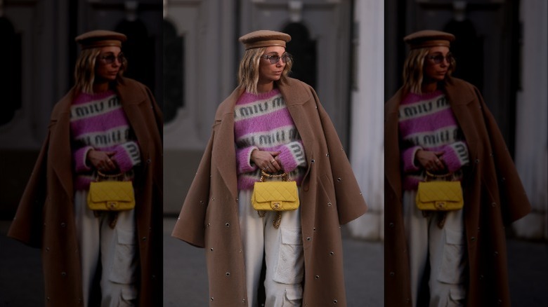 person in white cargo pants