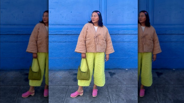 Pink clogs neon green pants