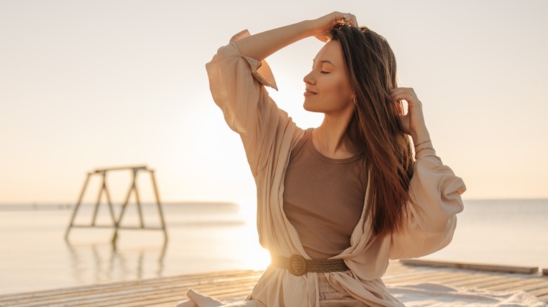 woman sitting in sunshine