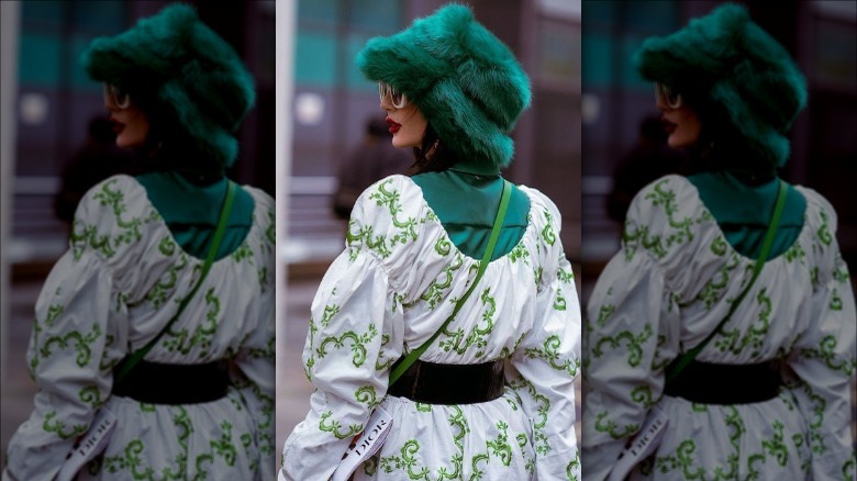 White and green voluminous dress and green hat