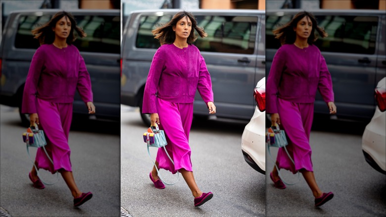 woman wearing pink loafers