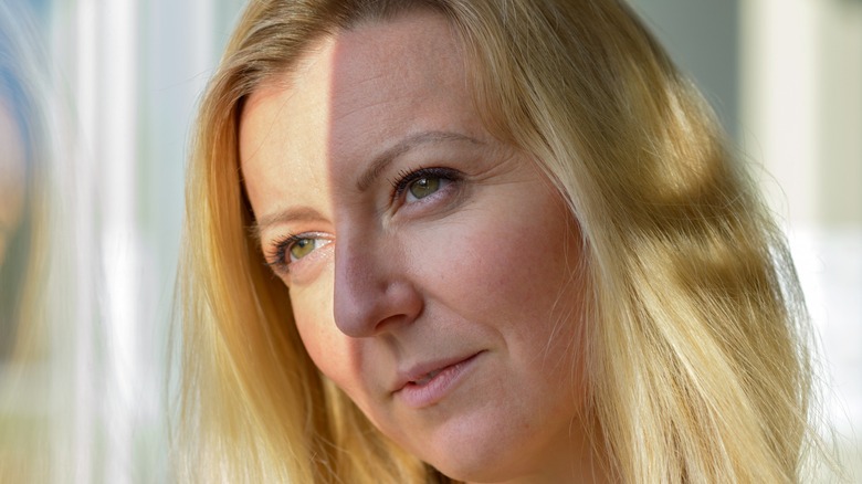 Woman with long eyebrow tails